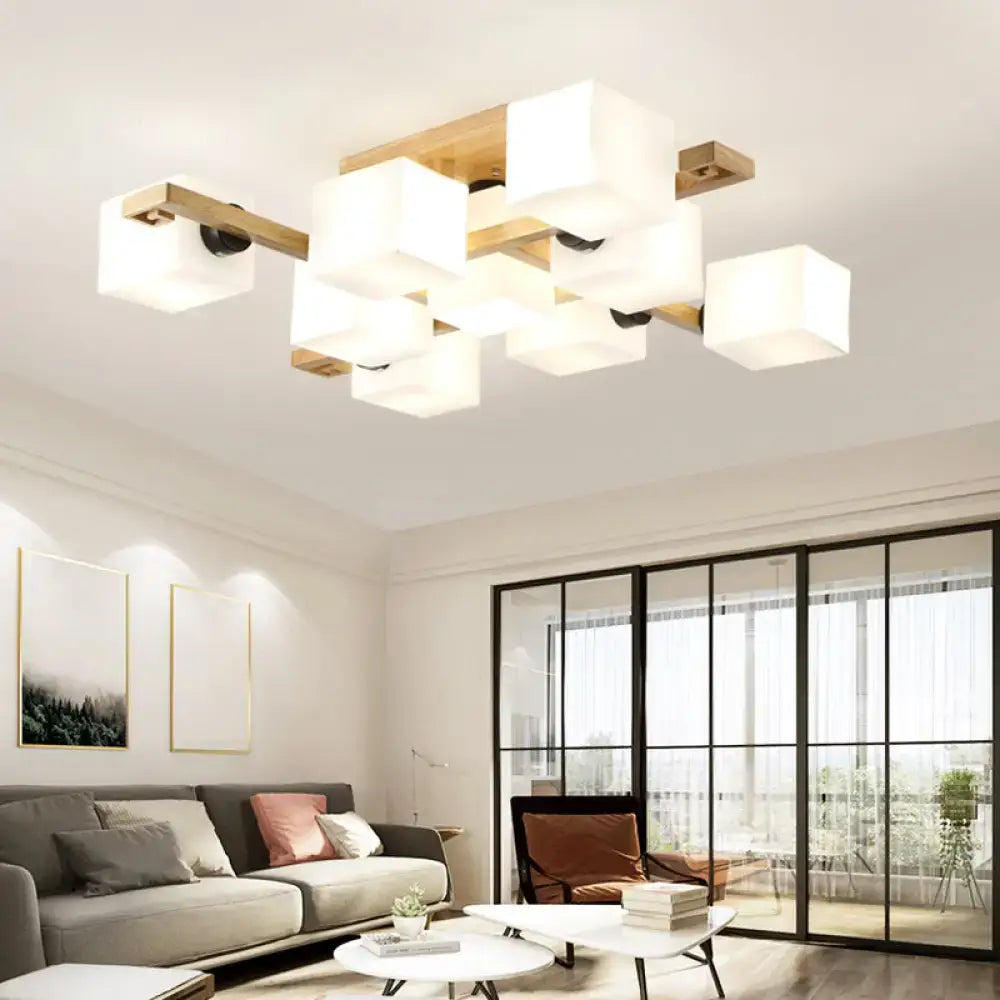 Modern geometric ceiling light with white glass cubes and wood canopy for living room lighting by decorbites