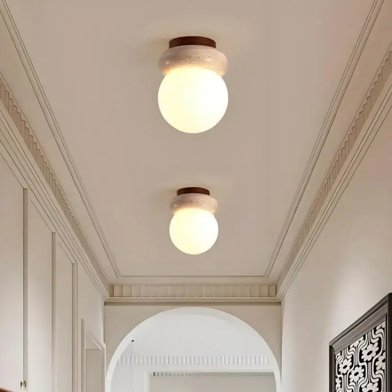 Modern wood base led ceiling light with two frosted globe lights beige stone base and dark wood trim by decorbites ceiling light