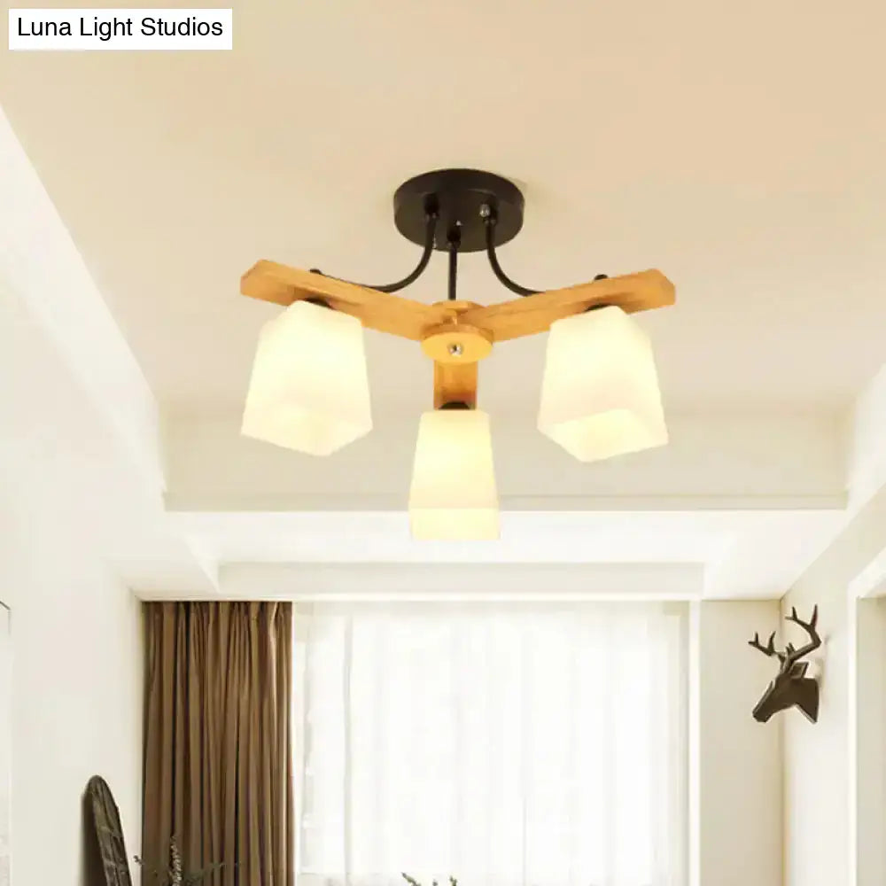 Modern wood and black semi flush mount ceiling light with milk glass shades and natural wood frame for living room use