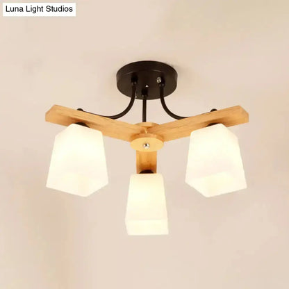 Modern wood and black semi flush mount living room light with milk glass shades and natural wood crossbar