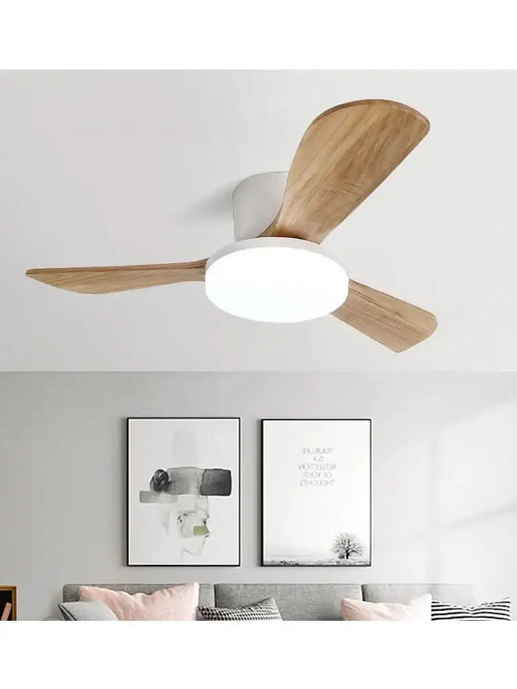 Modern wood ceiling fan light with three light wood blades and white circular motor housing for living room use