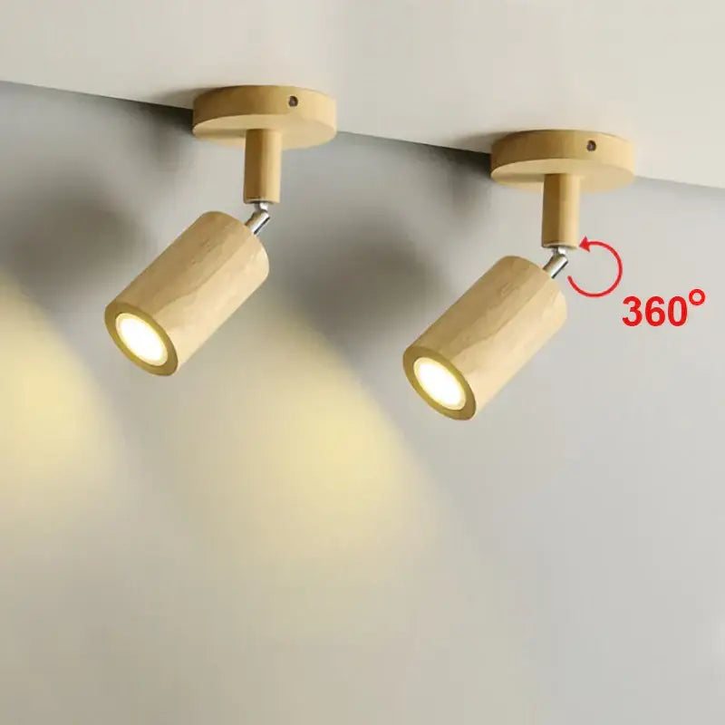 Modern wood ceiling light with two adjustable beige spotlights featuring textured cylindrical wooden bodies for living room