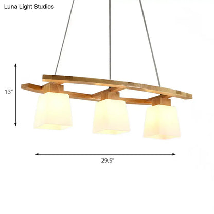 DecorBites Nordic hang lamp with three warm-toned frosted glass shades and wooden accents for dining room lighting