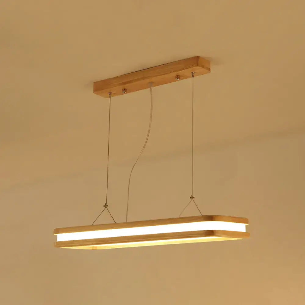 Modern wood rectangular hanging island lamp with warm wood finish and sleek led strip illumination for dining room