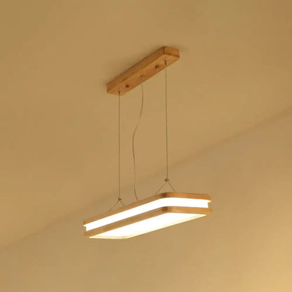 Modern wood rectangular hanging island lamp with warm wood frame and glowing led strips for dining room lighting