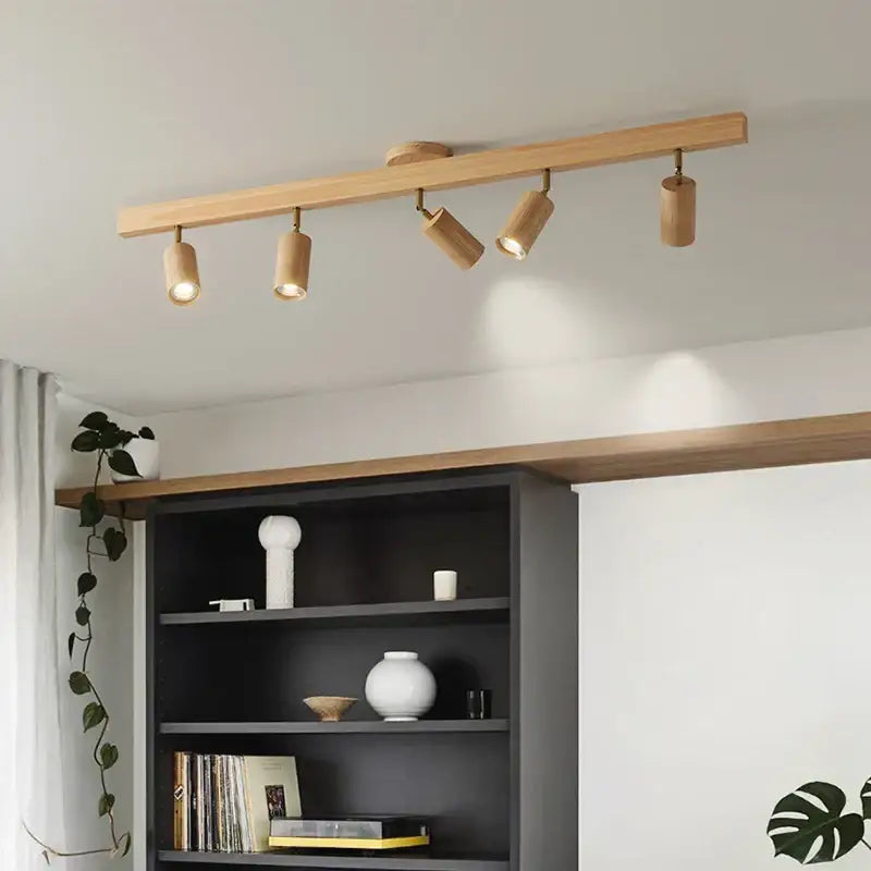Modern wood three light adjustable gu10 led ceiling lamp with light wood finish and four cylindrical spotlights by decorbites