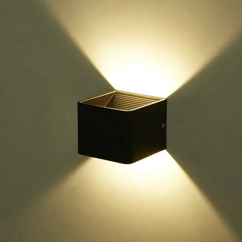 Modern wooden cube black led wall light with warm yellow illumination by decorbites led for bedroom sconce decor
