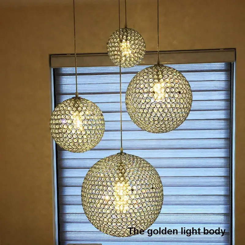 Modern woven glass crystal ball pendant light with golden crystal-encrusted design for dining room decorbites crystal ball