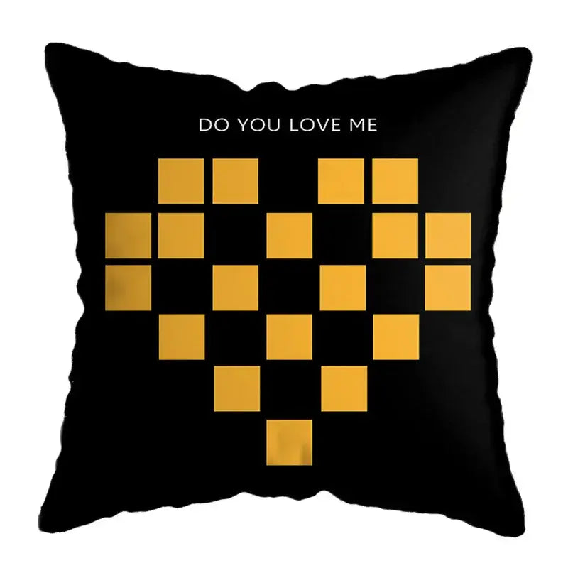Black throw pillow with pixelated gold heart and do you love me text in modern geometric deer print design