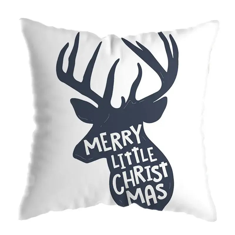 White throw pillow with navy blue geometric deer print and merry little christmas text for living room decor