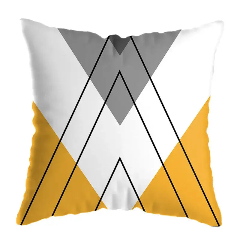A square throw pillow with a modern geometric deer print featuring bold yellow gray and white triangular patterns