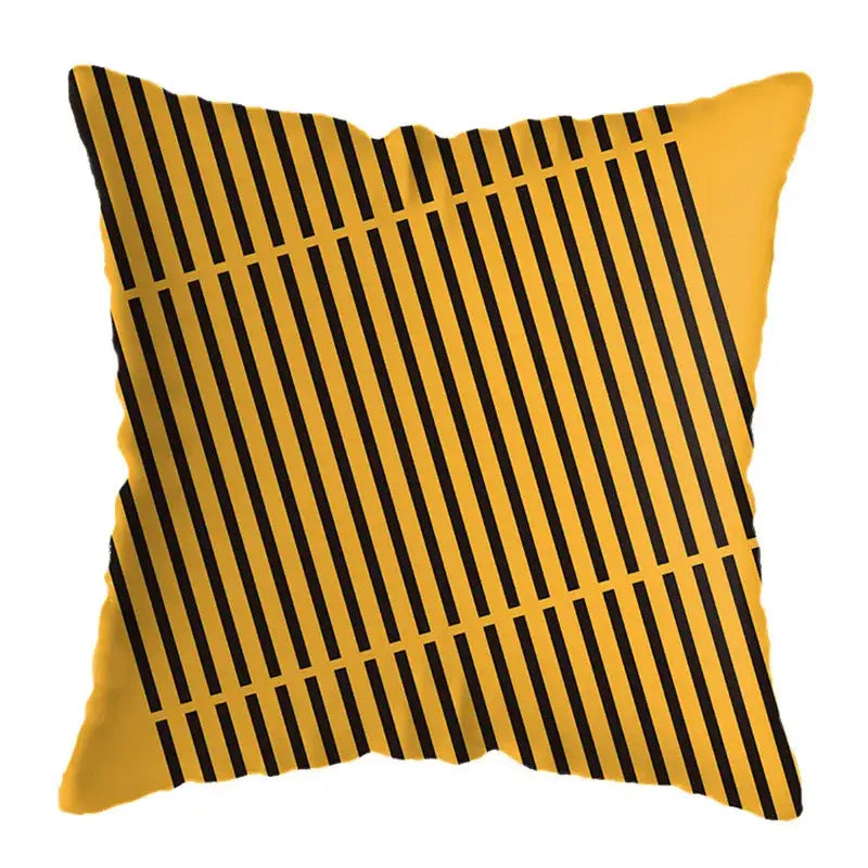 Square throw pillow with bold black vertical stripes on vibrant yellow background featuring geometric deer print design