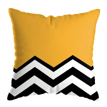 Yellow throw pillow with bold black and white zigzag pattern for modern geometric deer print living room decor