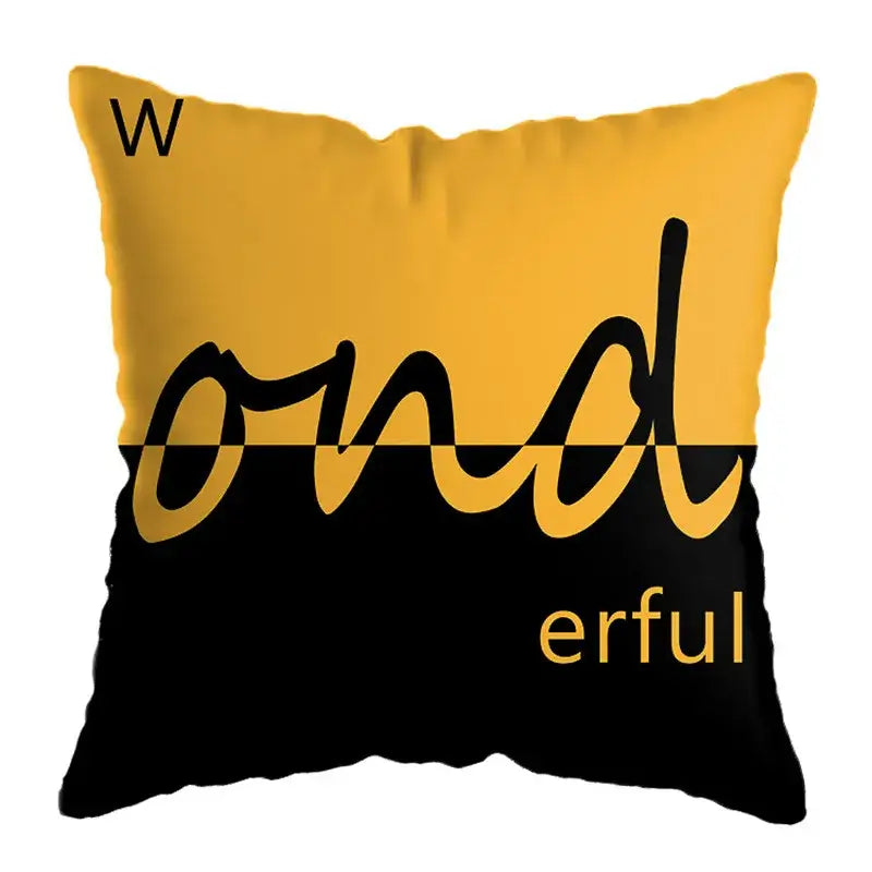 Modern yellow and black geometric deer print throw pillow with wonderful in bold script font for living room decor