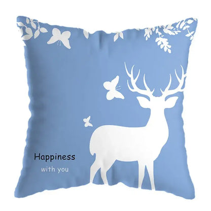 Blue cushion with white deer print and butterflies featuring happiness with you text for modern living room decor