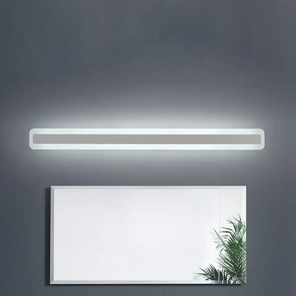 Modern yellow and gray bathroom vanity with white LED strip light mounted above a rectangular mirror for bright illumination