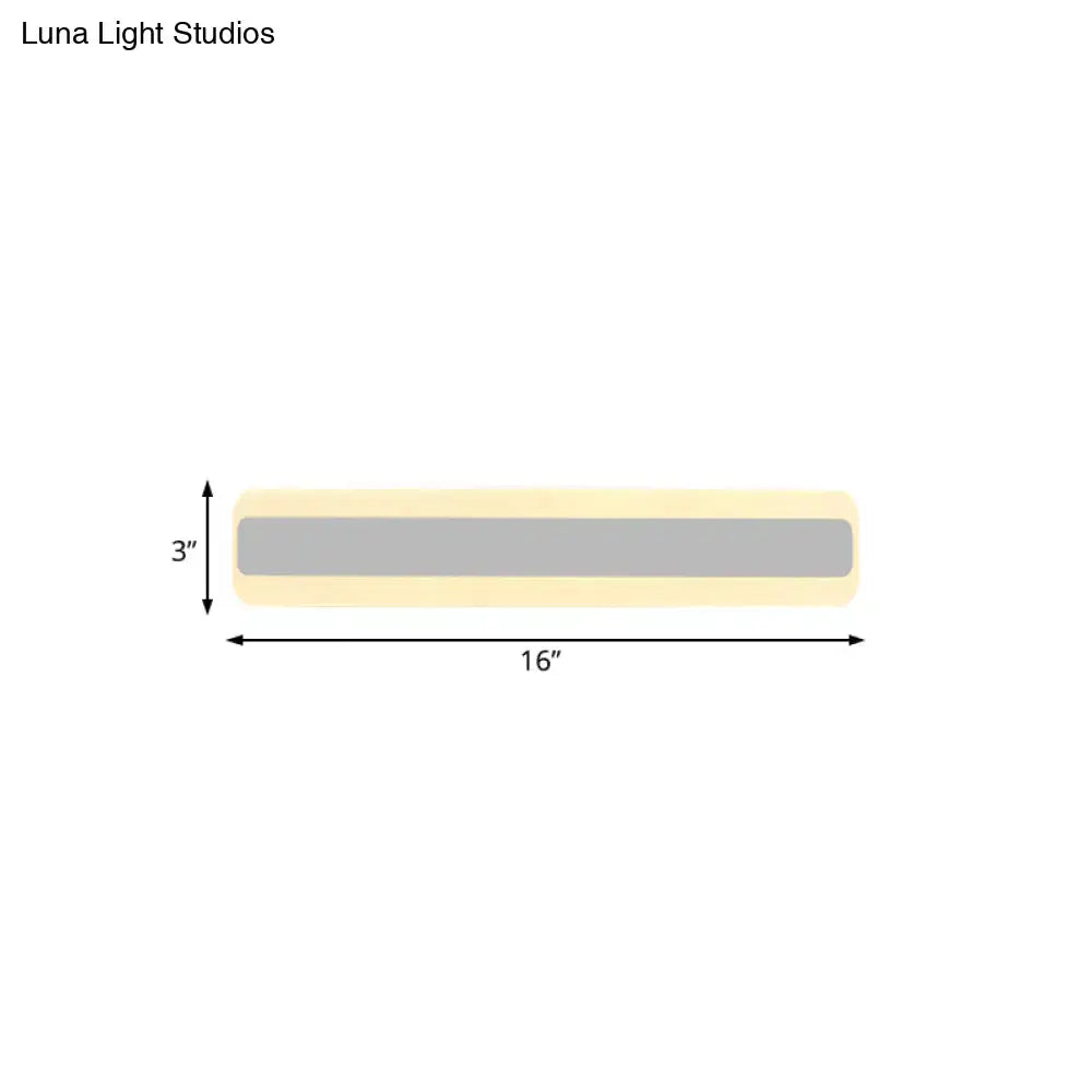 Modern yellow and gray led white light strip bathroom vanity fixture with pale yellow casing and central gray illuminated band