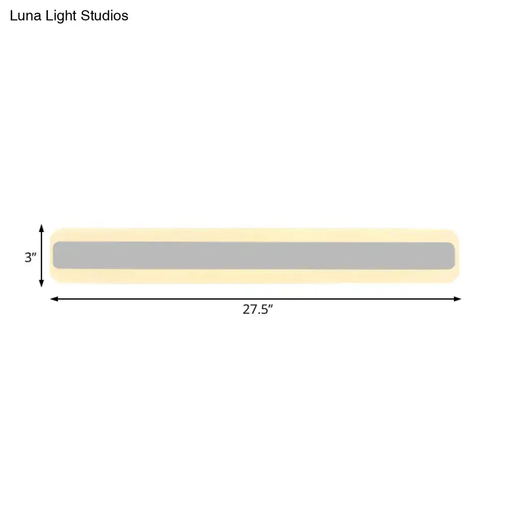 Modern yellow and gray bathroom vanity led light strip with white light features a sleek gray panel and cream casing