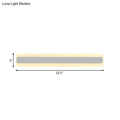 Modern yellow and gray led white light strip bathroom vanity fixture with soft yellow casing and gray illuminated panel