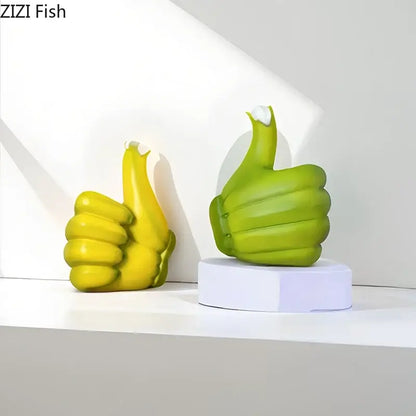 Modern yellow banana fist resin statue desk ornament featuring two glossy yellow and lime green thumbs-up sculptures