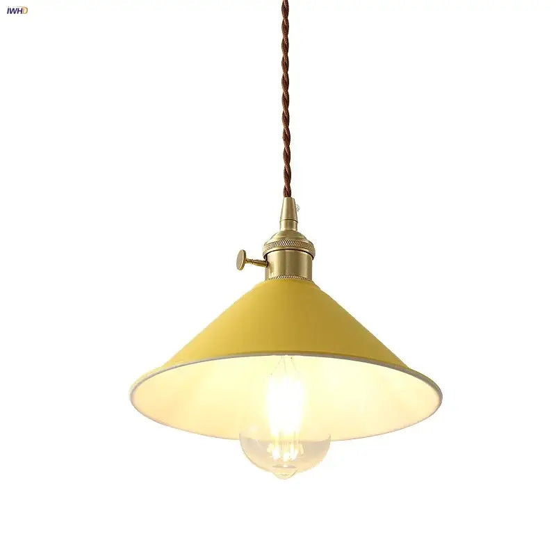 Modern yellow conical pendant light with decorbites copper knob brass hardware and twisted brown cord for kitchens