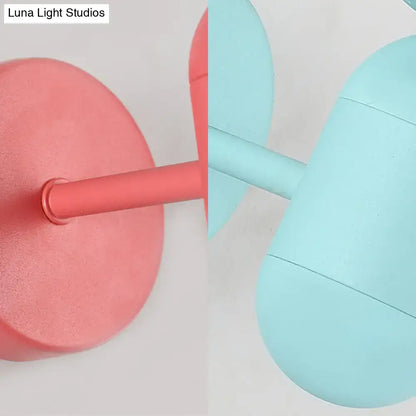 Modern yellow metal fixture wall lamp with pastel pink and light blue pill-shaped sconces for 220v-240v and 110v-120v use