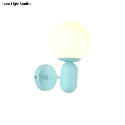 Pastel blue spherical wall sconce with frosted glass globe metal fixture suitable for 110v-120v and 220v-240v use
