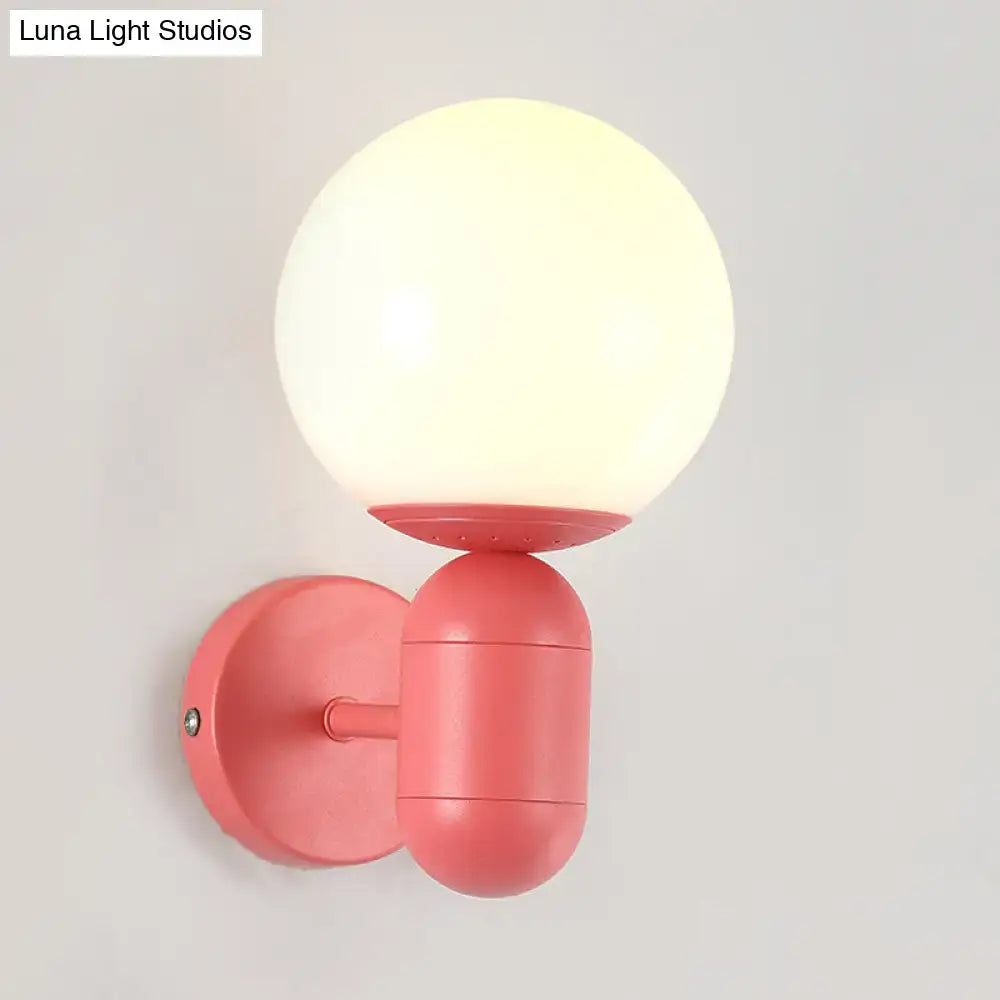 Modern yellow metal fixture wall lamp with pink frosted glass orb shade compatible with 110v-120v and 220v-240v