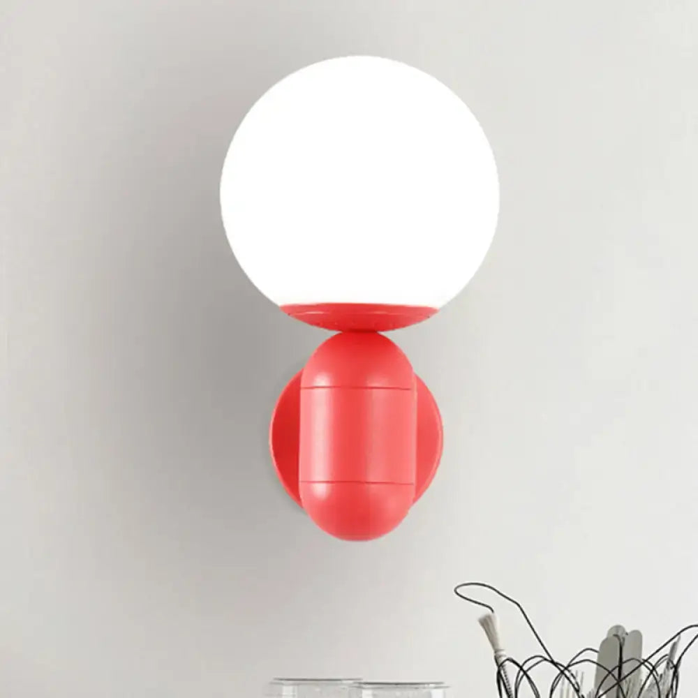 A vibrant coral-red metal fixture wall lamp with a frosted white glass globe suitable for 220v-240v and 110v-120v use