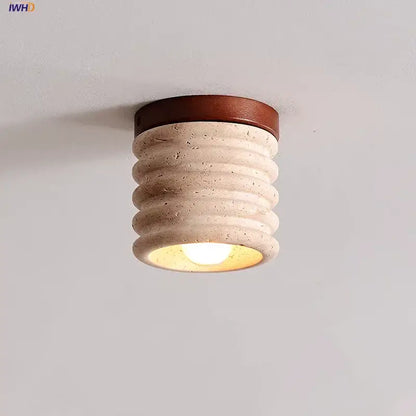 Modern yellow travertine ceiling light with beige textured concrete and brown leather-trimmed decorbites led wood design