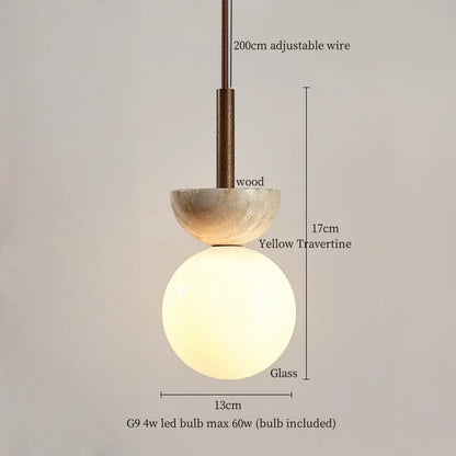Modern yellow travertine led pendant lights with a warm frosted glass globe and wooden accents for kitchen island decorbites