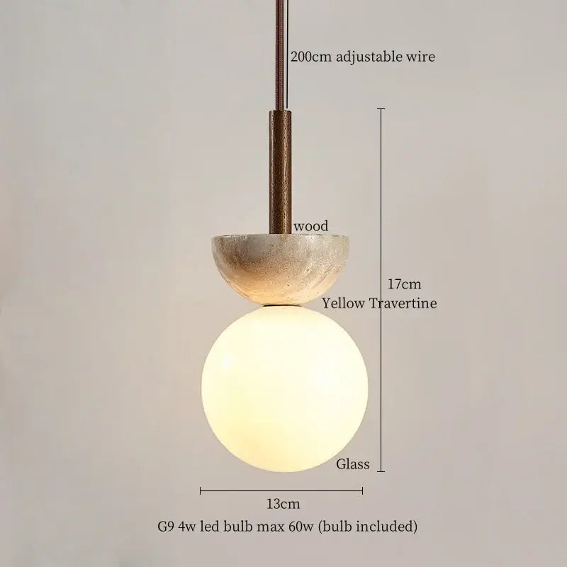 Modern yellow travertine led pendant lights with a warm frosted glass globe and wooden accents for kitchen island decorbites