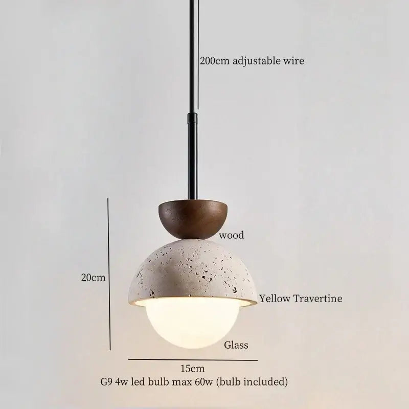 A modern pendant light with a dark wood top, decorbites yellow travertine dome, and frosted glass globe for kitchen island