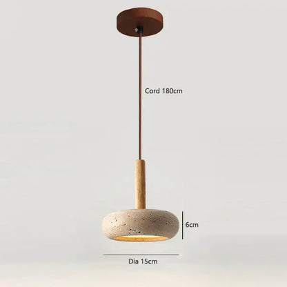 Modern yellow travertine stone pendant light with off-white concrete shade and wood stem for kitchen island lighting