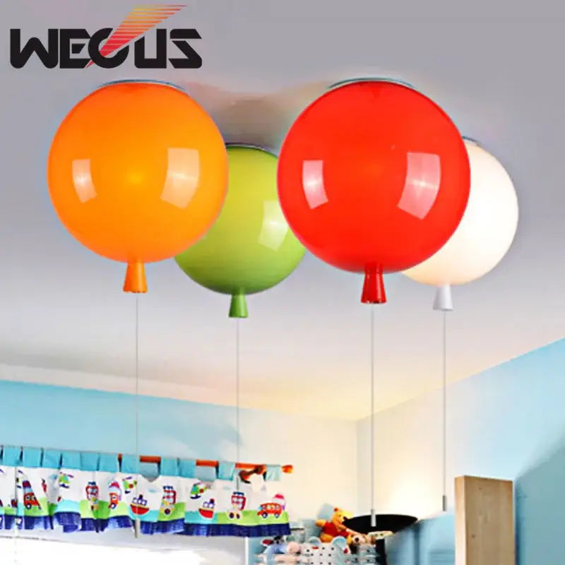 Three colorful glossy balloon lights in orange green and red with white accents for bedroom decorbites d200mm balloon light