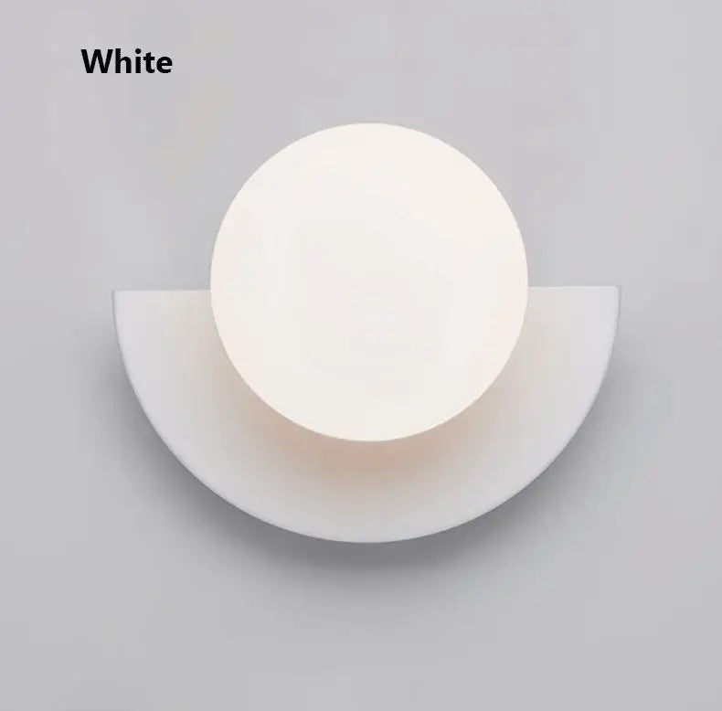 White minimalist kids macaron led wall lamp with circular diffused light and sleek semi-circular base decorbites kids macaron
