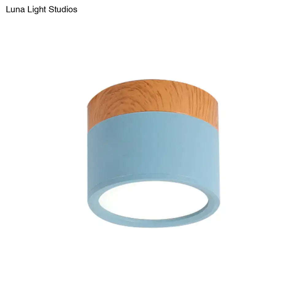 Decorbites™ small macaron flush mount ceiling light with matte blue metal body and natural wood top ring for kitchen bar
