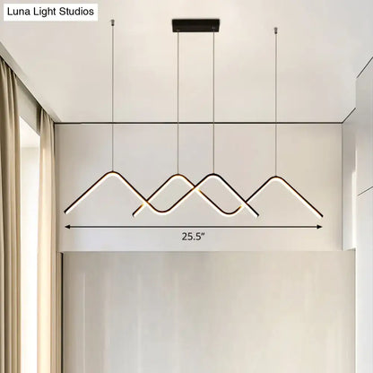 Modern minimalist led ceiling lamp by decorbites with sleek black metal frame and warm white mountain-shaped design