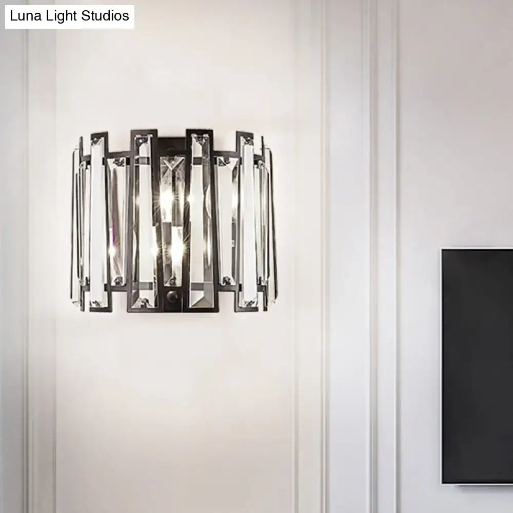 Modernist wall lamp with black finish and vertical crystal bars designed for corridor lighting