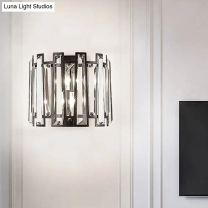 Modernist wall lamp with black finish and vertical crystal bars designed for corridor lighting