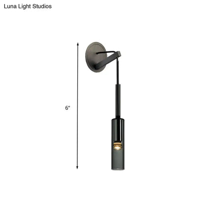 Modernist black led crystal tube wall sconce with adjustable arm and cylindrical glass shade featuring black matte finish
