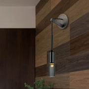 Modernist black led crystal tube wall sconce with sleek metallic finish and frosted glass shade for bedroom lighting