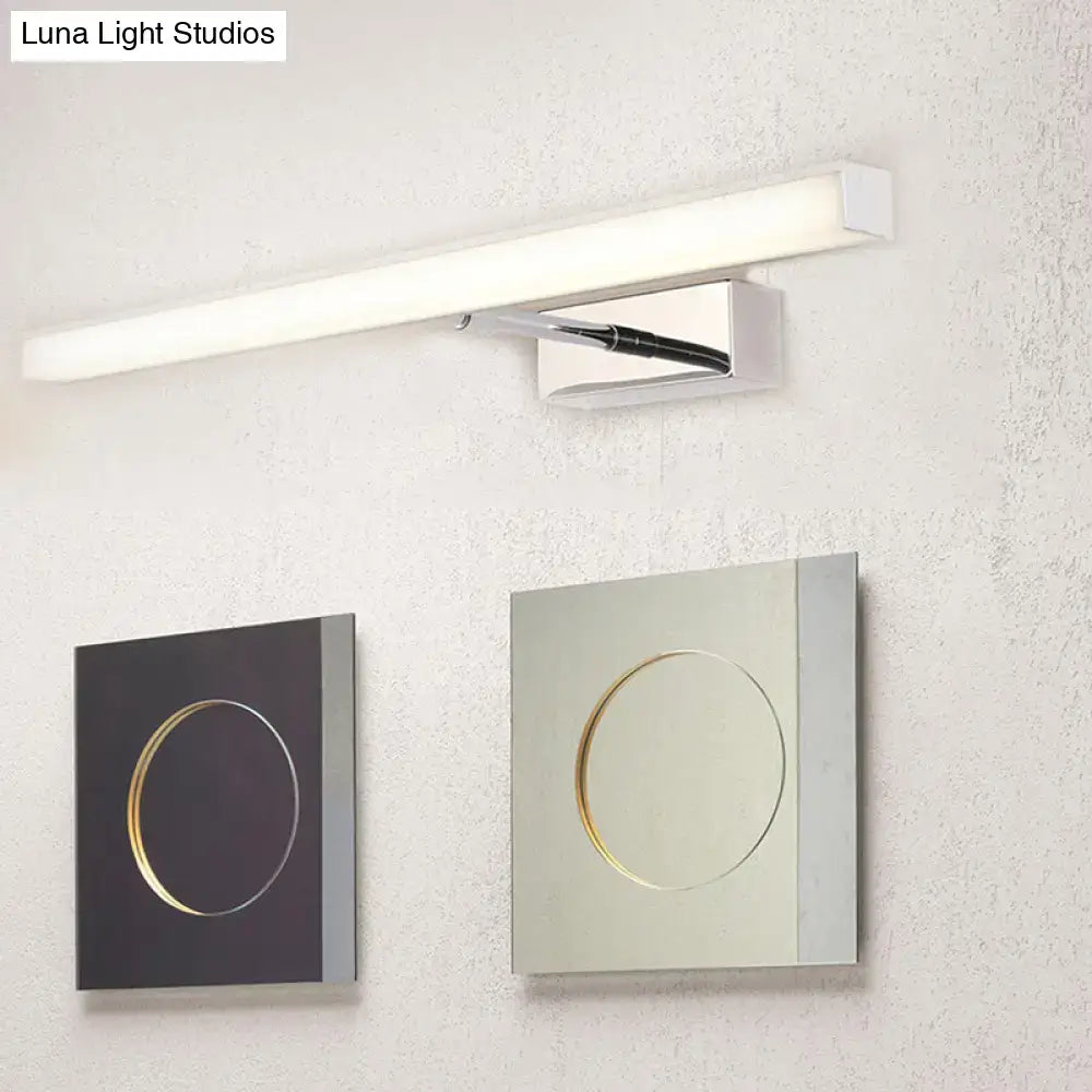 Modernist black and silver metal linear vanity sconce with chrome finish and integrated switch panel for bathroom use