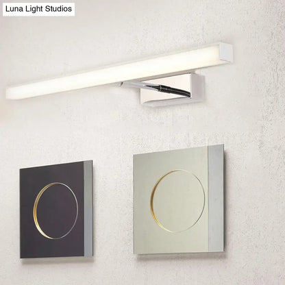 Modernist black and silver metal linear vanity sconce with chrome finish and integrated switch panel for bathroom use