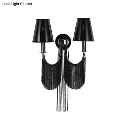 Modernist black and silver tassel wall sconce with e12 light, fringed design, chrome accents, and conical shades for bedroom