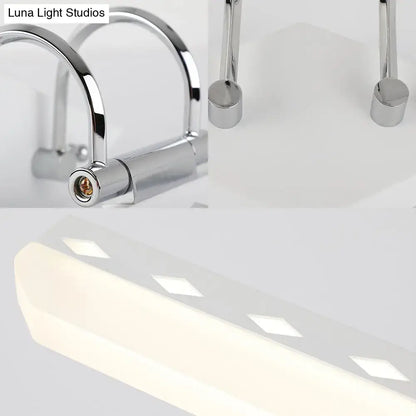 Modernist black and white led vanity light with curved arm and chrome finished metal faucet for natural light bathrooms