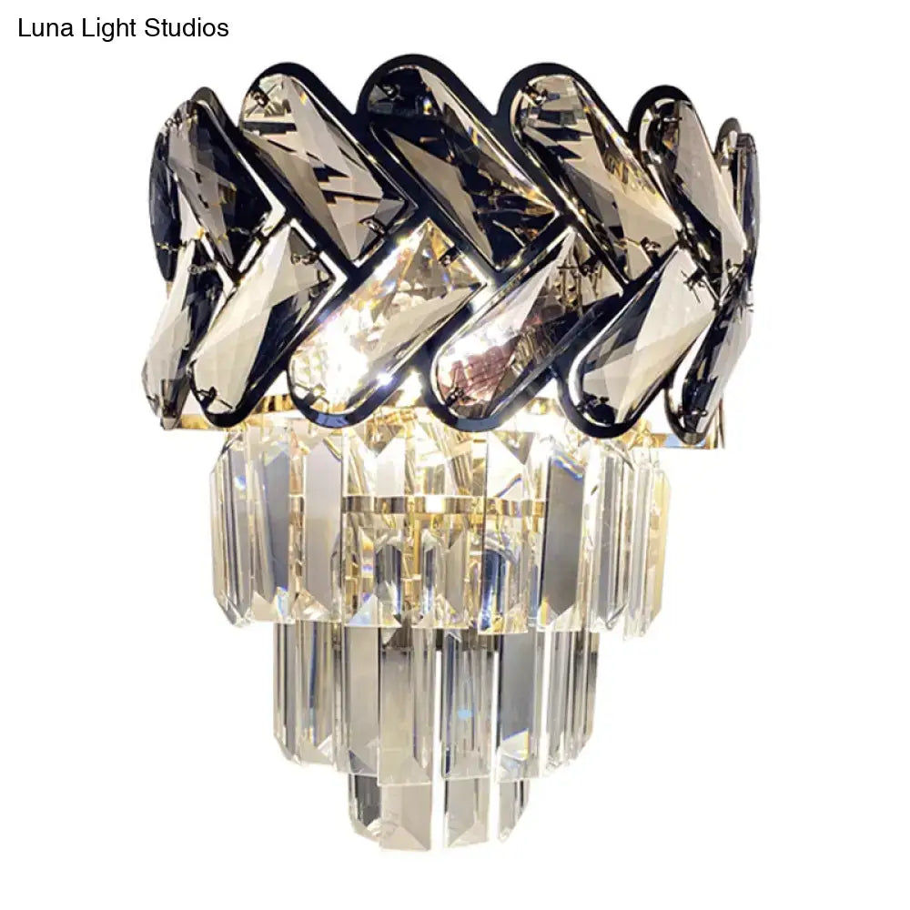Modernist chrome and crystal wall sconce with braided dark gray and clear crystal elements for family room