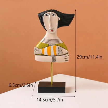 Modernist colorful ceramic abstract people statue figure with black hair striped green-and-white dress holding orange fish decorbites abstract people