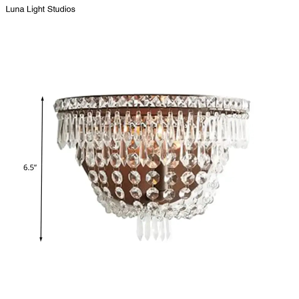 Modernist dark bronze crystal basket wall sconce with cascading clear crystals for elegant bedroom lighting