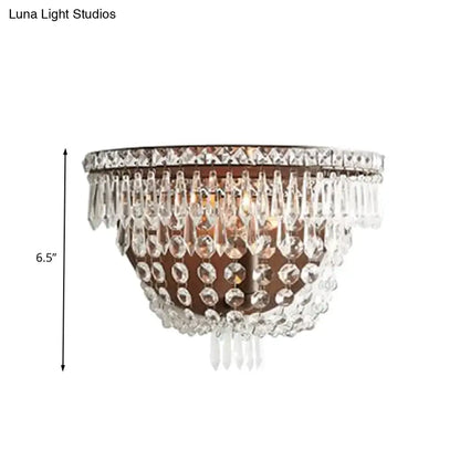 Modernist dark bronze crystal basket wall sconce with cascading clear crystals for elegant bedroom lighting
